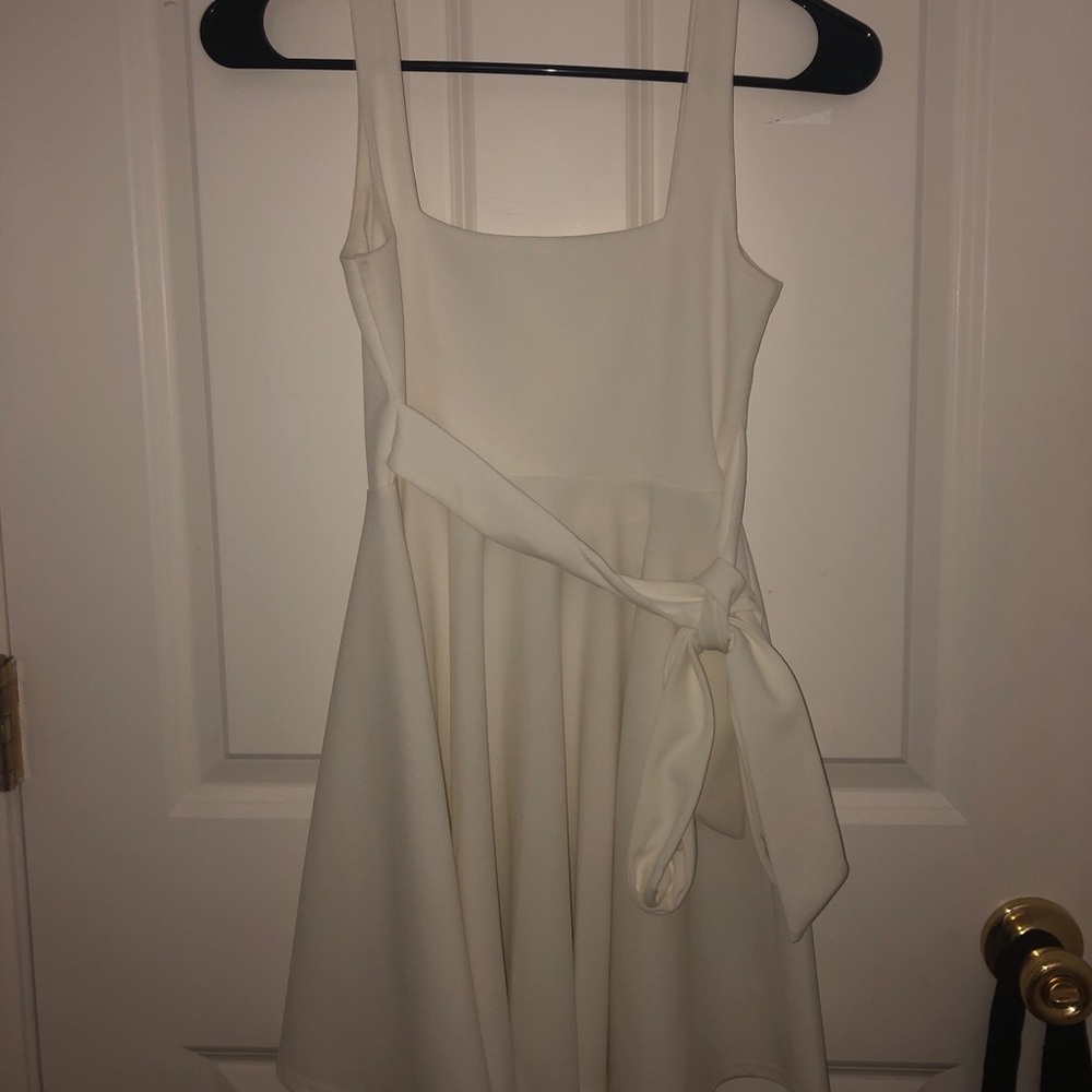 White dress with wrap around bow